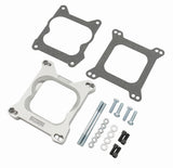Adapts 4-barrel Square Flange carburetors to spreadbore intake manifolds.